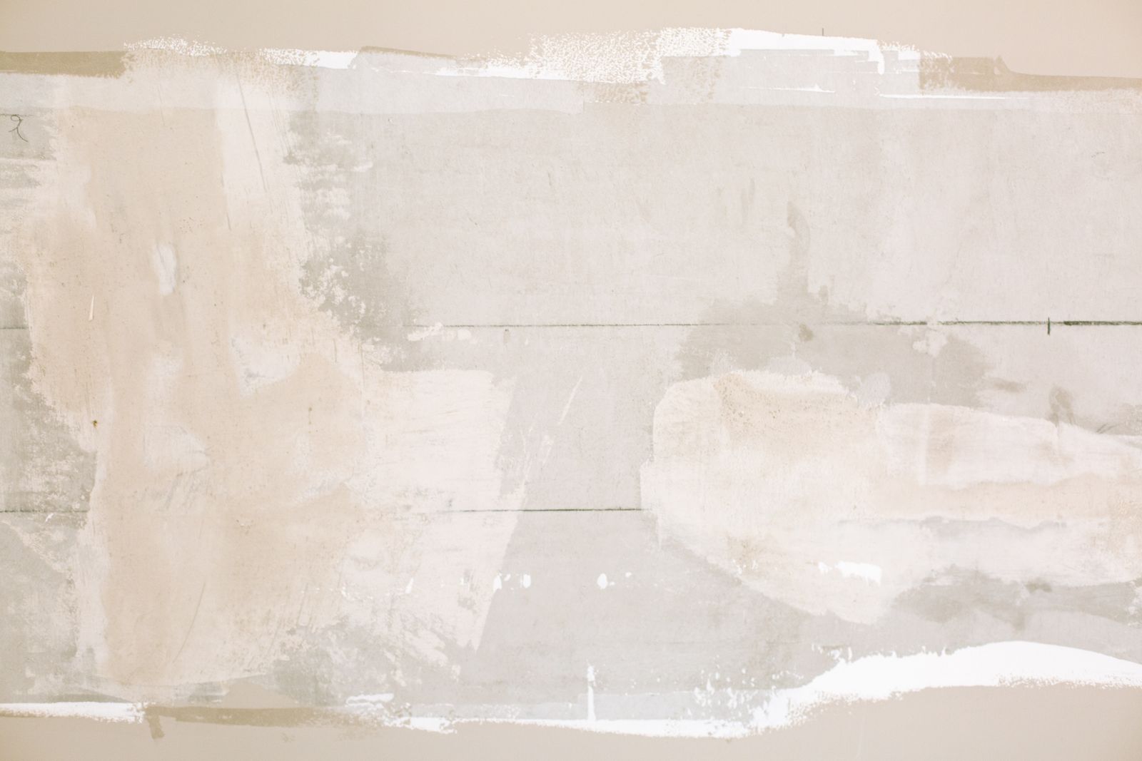 Before: textured, painted wall