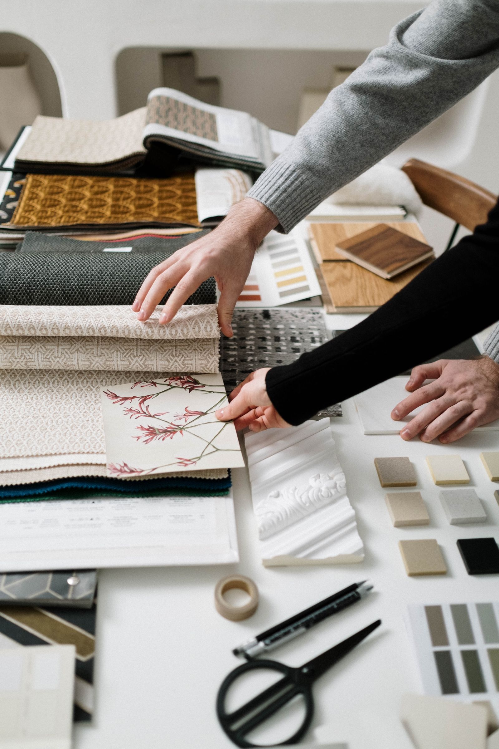 Wallpaper sample books on a dining table